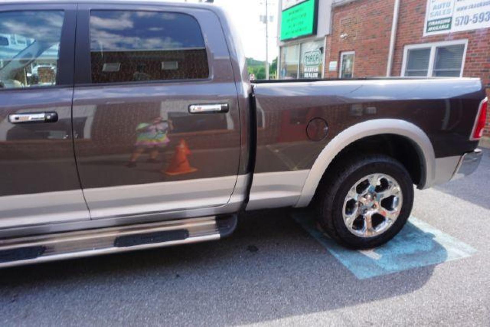 2015 Ram 1500 Laramie (1C6RR7VT0FS) with an HEMI 5.7L V-8 variable valve control engine, located at 312 Centre Ave, Schuylkill Haven, PA, 17972, (570) 593-5278, 40.638130, -76.177383 - back up camera, bluetooth connection, cooled front seats, heated front seats, locking/limited slip differential, navigation system, passive keyless entry, power driver's seat, rear parking sensors, remote engine starter, towing pkg - Photo#33