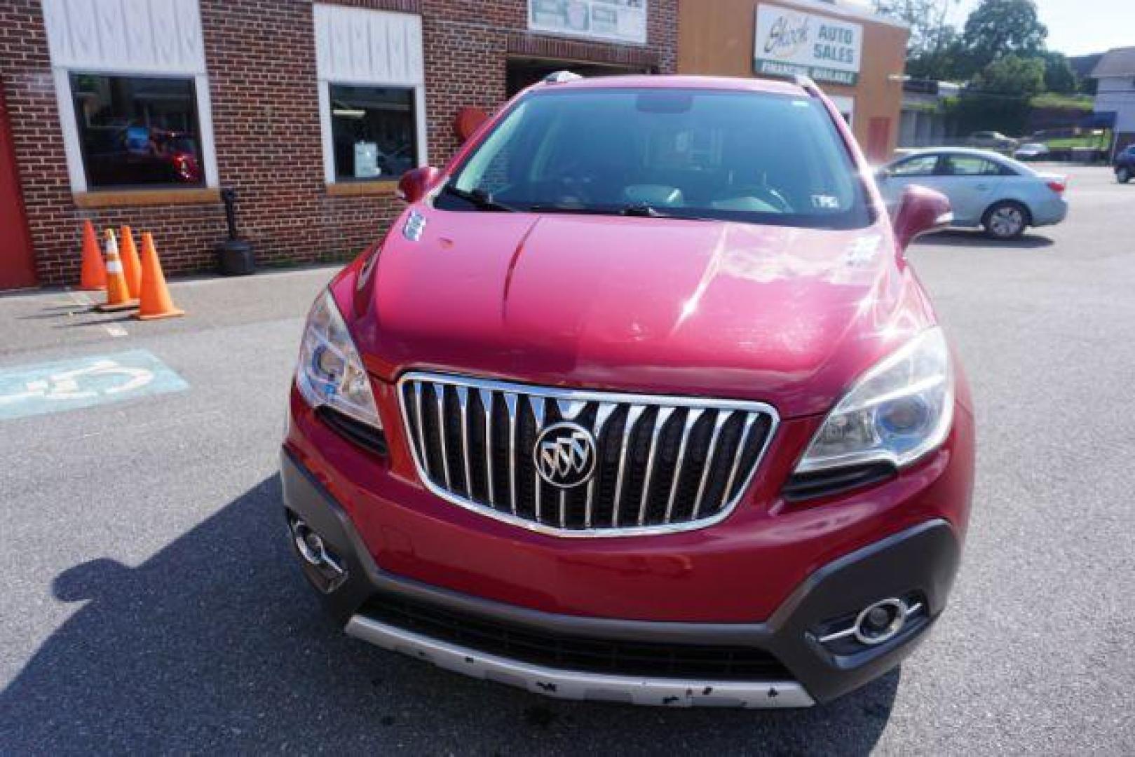 2014 Ruby Red Metallic Buick Encore Convenience AWD (KL4CJFSB5EB) with an 1.4L L4 DOHC 16V TUR engine, 6-Speed Automatic transmission, located at 312 Centre Ave, Schuylkill Haven, PA, 17972, (570) 593-5278, 40.638130, -76.177383 - Photo#1