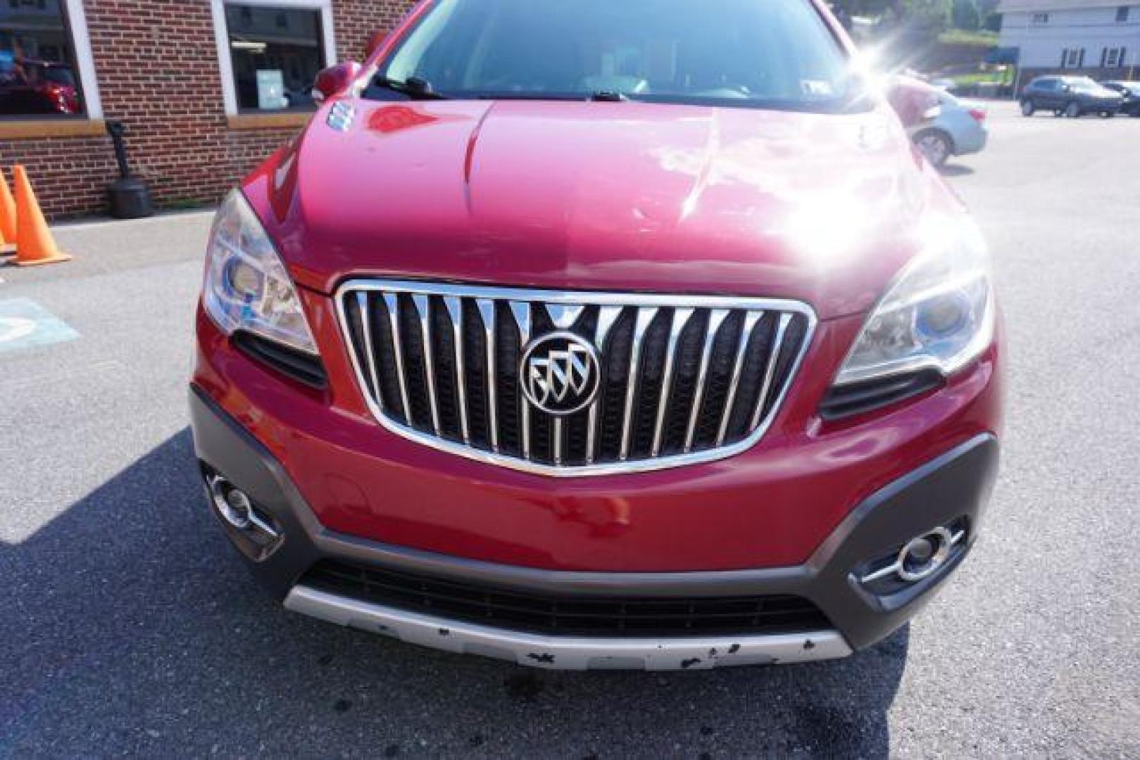 2014 Ruby Red Metallic Buick Encore Convenience AWD (KL4CJFSB5EB) with an 1.4L L4 DOHC 16V TUR engine, 6-Speed Automatic transmission, located at 312 Centre Ave, Schuylkill Haven, PA, 17972, (570) 593-5278, 40.638130, -76.177383 - Photo#2