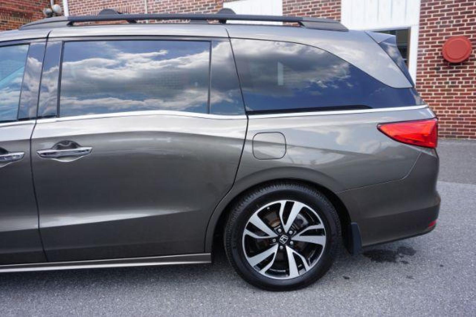 2018 Pacific Pewter Metallic /Gray Honda Odyssey Elite (5FNRL6H94JB) with an 3.5L V-6 gasoline direct injection engine, located at 312 Centre Ave, Schuylkill Haven, PA, 17972, (570) 593-5278, 40.638130, -76.177383 - Photo#1