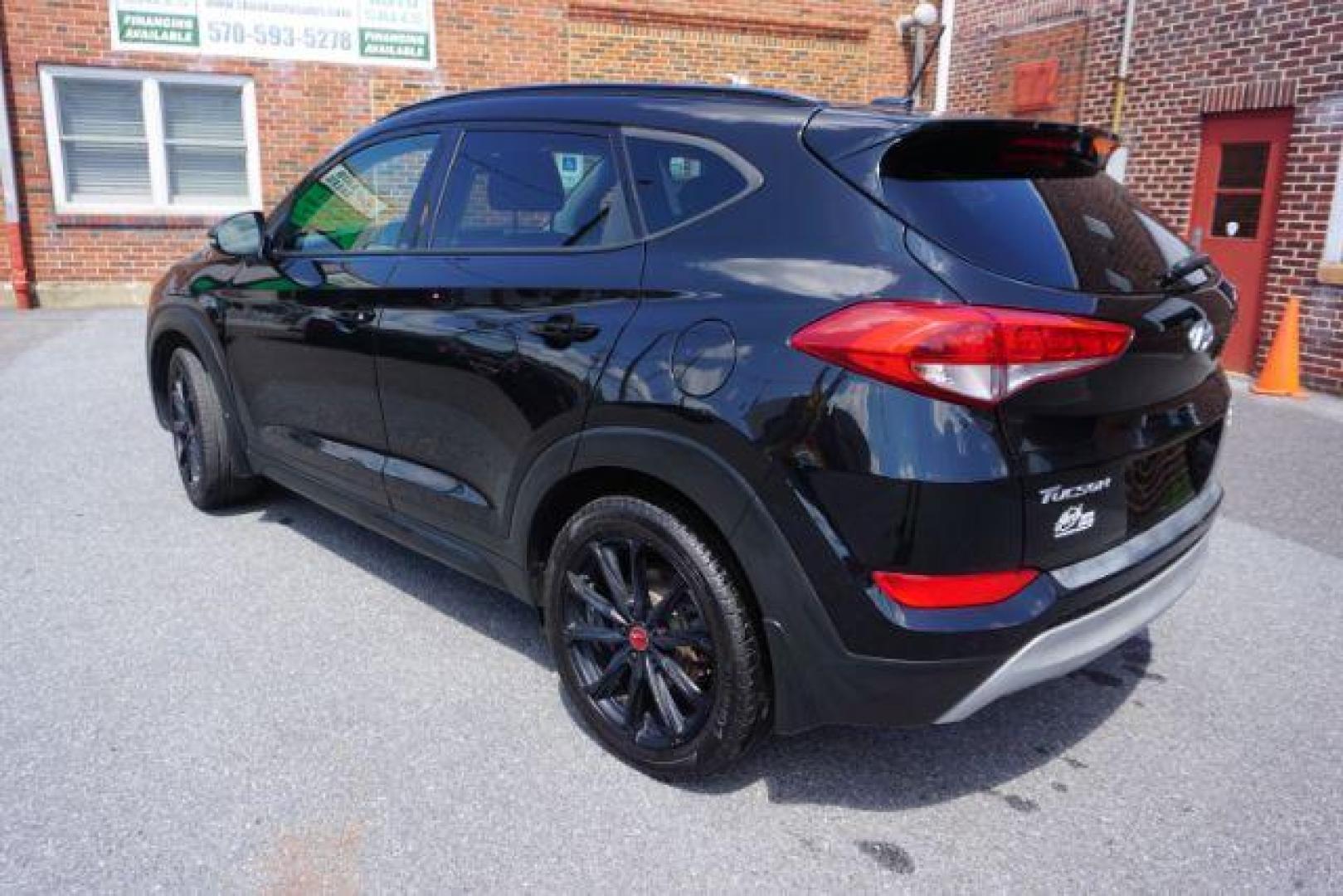 2017 Black Noir Pearl /Black Hyundai Tucson Night (KM8J3CA29HU) with an 1.6L I-4 gasoline direct injection engine, located at 312 Centre Ave, Schuylkill Haven, PA, 17972, (570) 593-5278, 40.638130, -76.177383 - Photo#3