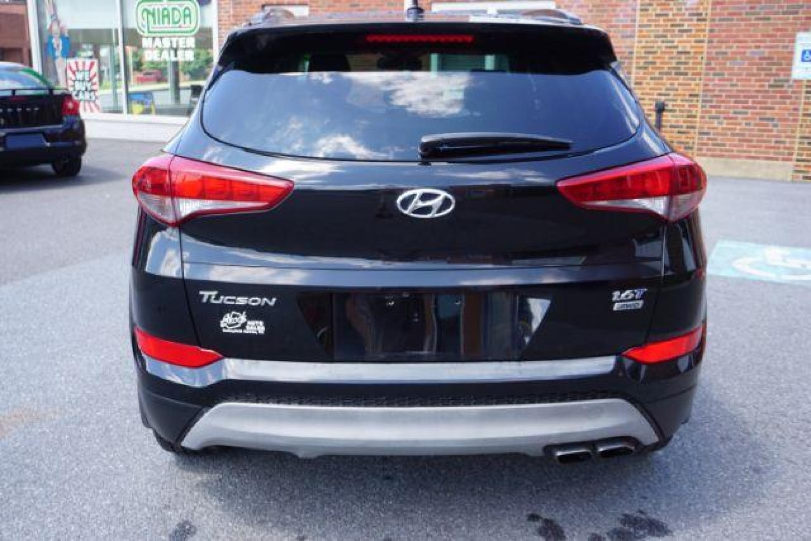 2017 Black Noir Pearl /Black Hyundai Tucson Night (KM8J3CA29HU) with an 1.6L I-4 gasoline direct injection engine, located at 312 Centre Ave, Schuylkill Haven, PA, 17972, (570) 593-5278, 40.638130, -76.177383 - Photo#4