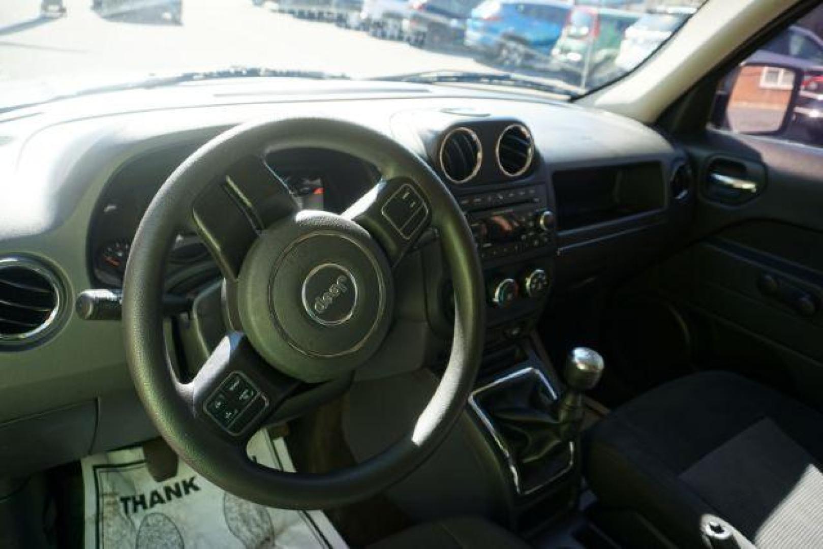 2017 Granite Crystal Metallic Clearcoat /Light Pebble Beige/Dark Slate Gray Jeep Patriot Sport 4x4 (1C4NJRBB1HD) with an 2.4L I-4 DOHC engine, located at 312 Centre Ave, Schuylkill Haven, PA, 17972, (570) 593-5278, 40.638130, -76.177383 - Photo#21