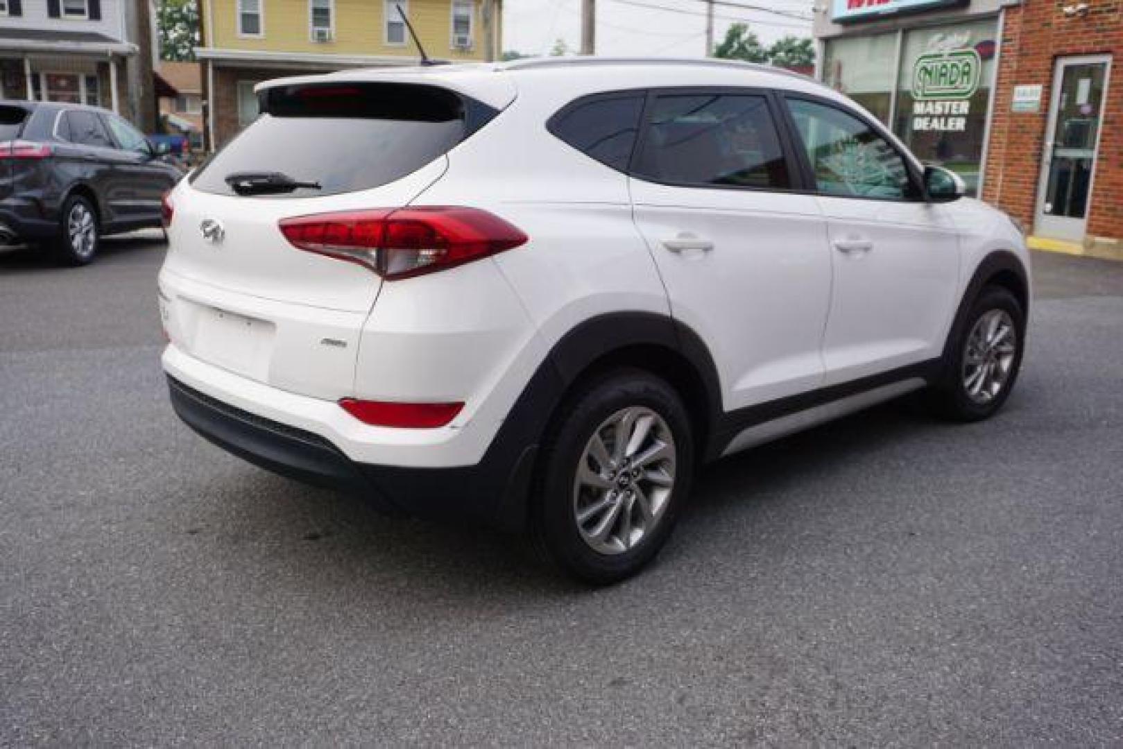 2017 Winter White /Gray Hyundai Tucson SE (KM8J3CA4XHU) with an Nu 2L I-4 gasoline direct injection engine, located at 312 Centre Ave, Schuylkill Haven, PA, 17972, (570) 593-5278, 40.638130, -76.177383 - Photo#6