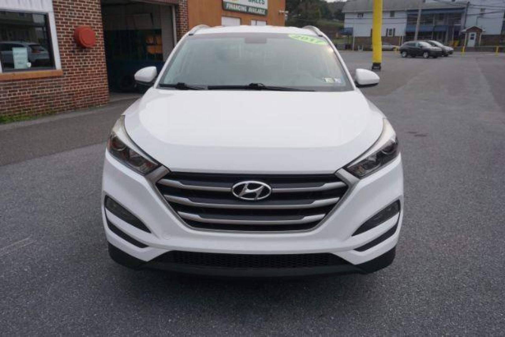 2017 Winter White /Gray Hyundai Tucson SE (KM8J3CA4XHU) with an Nu 2L I-4 gasoline direct injection engine, located at 312 Centre Ave, Schuylkill Haven, PA, 17972, (570) 593-5278, 40.638130, -76.177383 - Photo#4