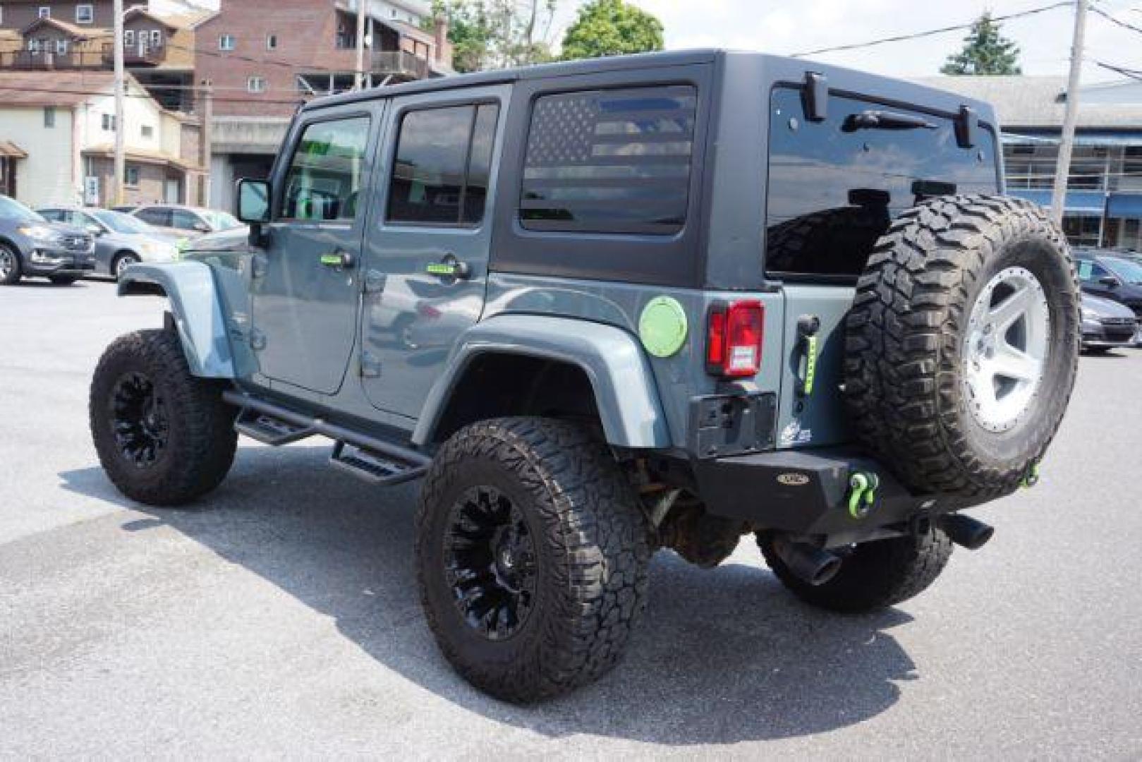 2015 Billet Silver Metallic Clearcoat /Black Jeep Wrangler Unlimited Sahara (1C4HJWEG5FL) with an 3.6L V-6 DOHC engine, located at 312 Centre Ave, Schuylkill Haven, PA, 17972, (570) 593-5278, 40.638130, -76.177383 - Photo#4