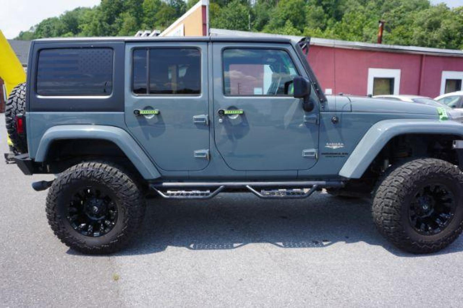 2015 Billet Silver Metallic Clearcoat /Black Jeep Wrangler Unlimited Sahara (1C4HJWEG5FL) with an 3.6L V-6 DOHC engine, located at 312 Centre Ave, Schuylkill Haven, PA, 17972, (570) 593-5278, 40.638130, -76.177383 - Photo#9
