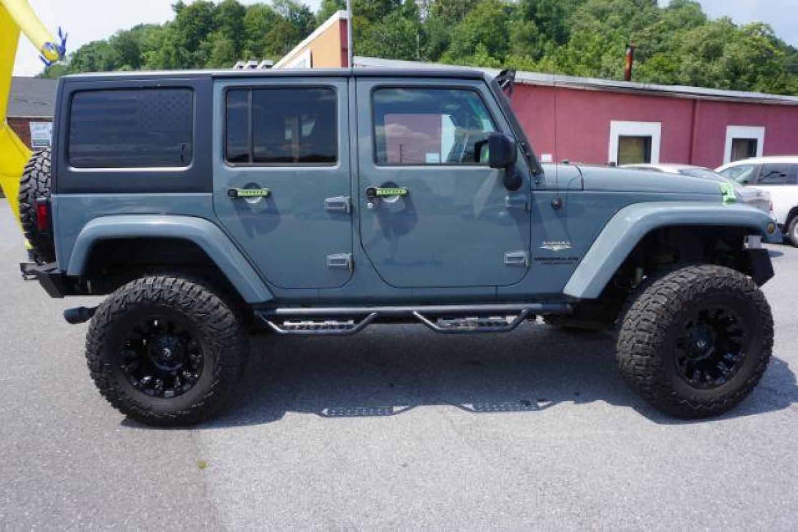 2015 Billet Silver Metallic Clearcoat /Black Jeep Wrangler Unlimited Sahara (1C4HJWEG5FL) with an 3.6L V-6 DOHC engine, located at 312 Centre Ave, Schuylkill Haven, PA, 17972, (570) 593-5278, 40.638130, -76.177383 - Photo#10