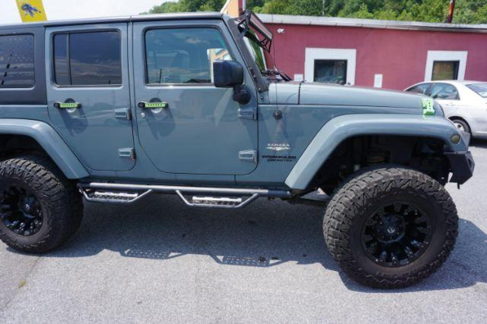 2015 Billet Silver Metallic Clearcoat /Black Jeep Wrangler Unlimited Sahara (1C4HJWEG5FL) with an 3.6L V-6 DOHC engine, located at 312 Centre Ave, Schuylkill Haven, PA, 17972, (570) 593-5278, 40.638130, -76.177383 - Photo#11