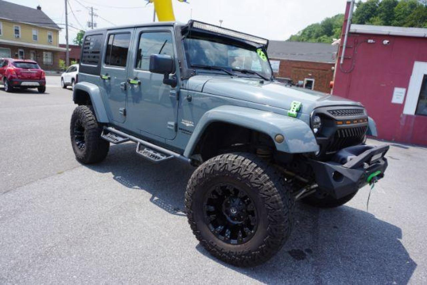 2015 Billet Silver Metallic Clearcoat /Black Jeep Wrangler Unlimited Sahara (1C4HJWEG5FL) with an 3.6L V-6 DOHC engine, located at 312 Centre Ave, Schuylkill Haven, PA, 17972, (570) 593-5278, 40.638130, -76.177383 - Photo#12