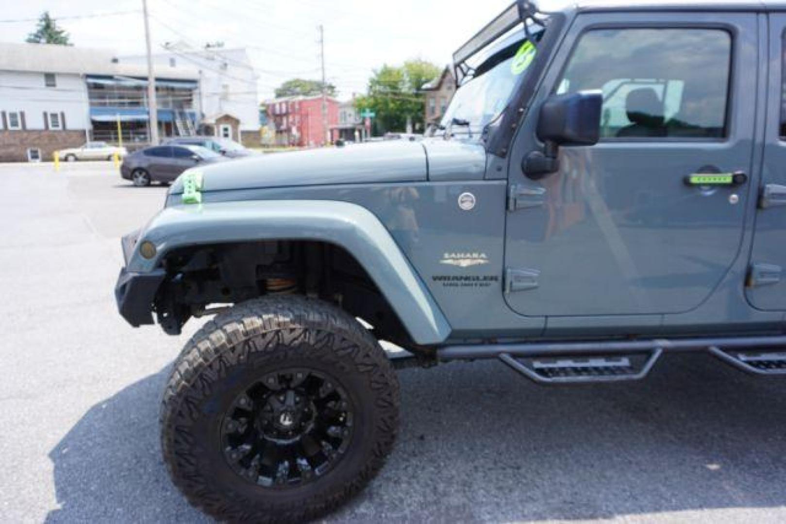 2015 Billet Silver Metallic Clearcoat /Black Jeep Wrangler Unlimited Sahara (1C4HJWEG5FL) with an 3.6L V-6 DOHC engine, located at 312 Centre Ave, Schuylkill Haven, PA, 17972, (570) 593-5278, 40.638130, -76.177383 - Photo#28