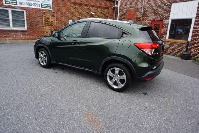 2017 Misty Green Pearl /Gray Honda HR-V EX-L (3CZRU6H77HM) with an 1.8L I-4 variable valve control engine, located at 312 Centre Ave, Schuylkill Haven, PA, 17972, (570) 593-5278, 40.638130, -76.177383 - Photo#5