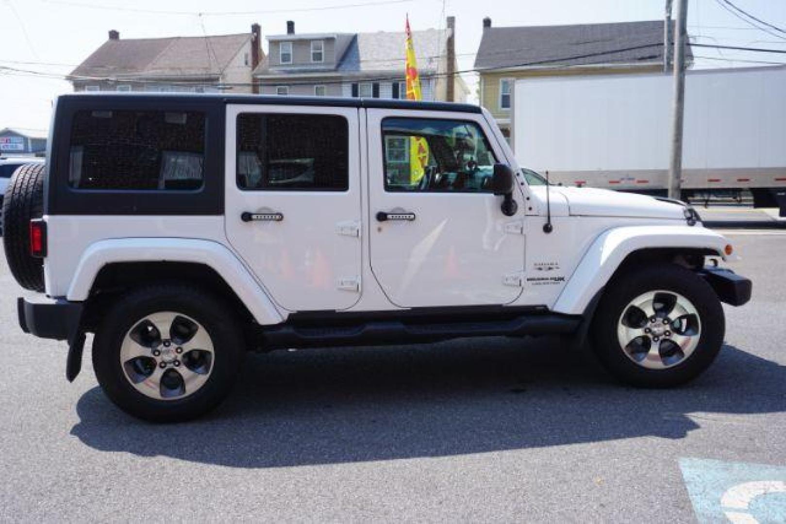 2018 Bright White Clearcoat /Black Jeep Wrangler JK Unlimited Sahara 4x4 (1C4BJWEG0JL) with an Pentastar 3.6L V-6 DOHC engine, located at 312 Centre Ave, Schuylkill Haven, PA, 17972, (570) 593-5278, 40.638130, -76.177383 - Photo#9