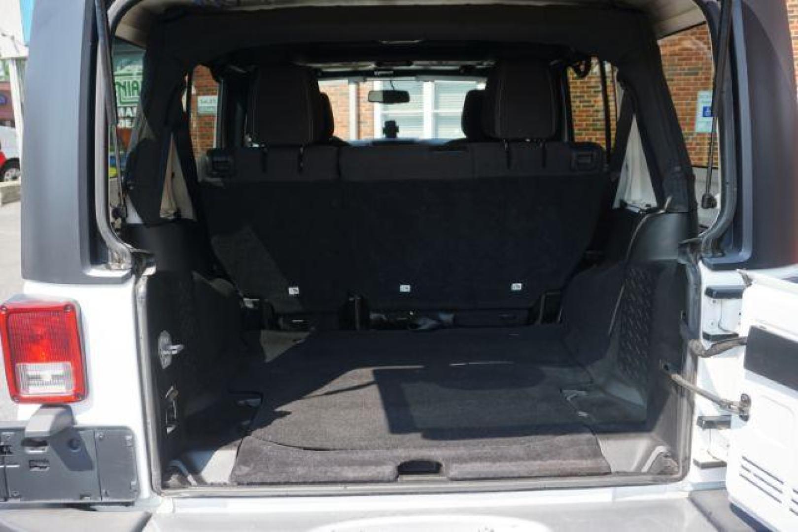 2018 Bright White Clearcoat /Black Jeep Wrangler JK Unlimited Sahara 4x4 (1C4BJWEG0JL) with an Pentastar 3.6L V-6 DOHC engine, located at 312 Centre Ave, Schuylkill Haven, PA, 17972, (570) 593-5278, 40.638130, -76.177383 - Photo#19