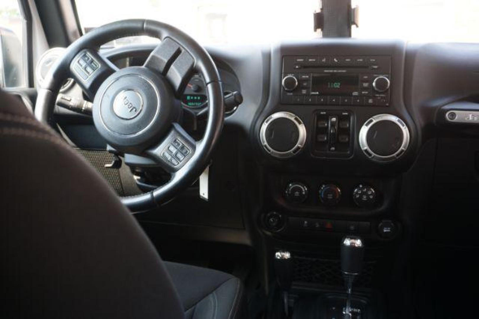 2018 Bright White Clearcoat /Black Jeep Wrangler JK Unlimited Sahara 4x4 (1C4BJWEG0JL) with an Pentastar 3.6L V-6 DOHC engine, located at 312 Centre Ave, Schuylkill Haven, PA, 17972, (570) 593-5278, 40.638130, -76.177383 - Photo#23