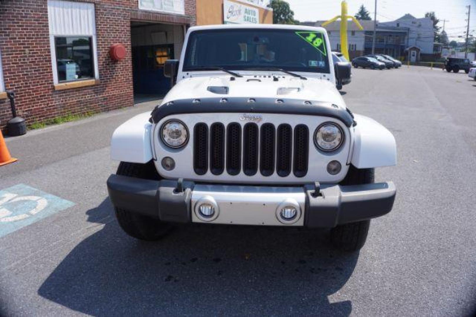 2018 Bright White Clearcoat /Black Jeep Wrangler JK Unlimited Sahara 4x4 (1C4BJWEG0JL) with an Pentastar 3.6L V-6 DOHC engine, located at 312 Centre Ave, Schuylkill Haven, PA, 17972, (570) 593-5278, 40.638130, -76.177383 - Photo#6