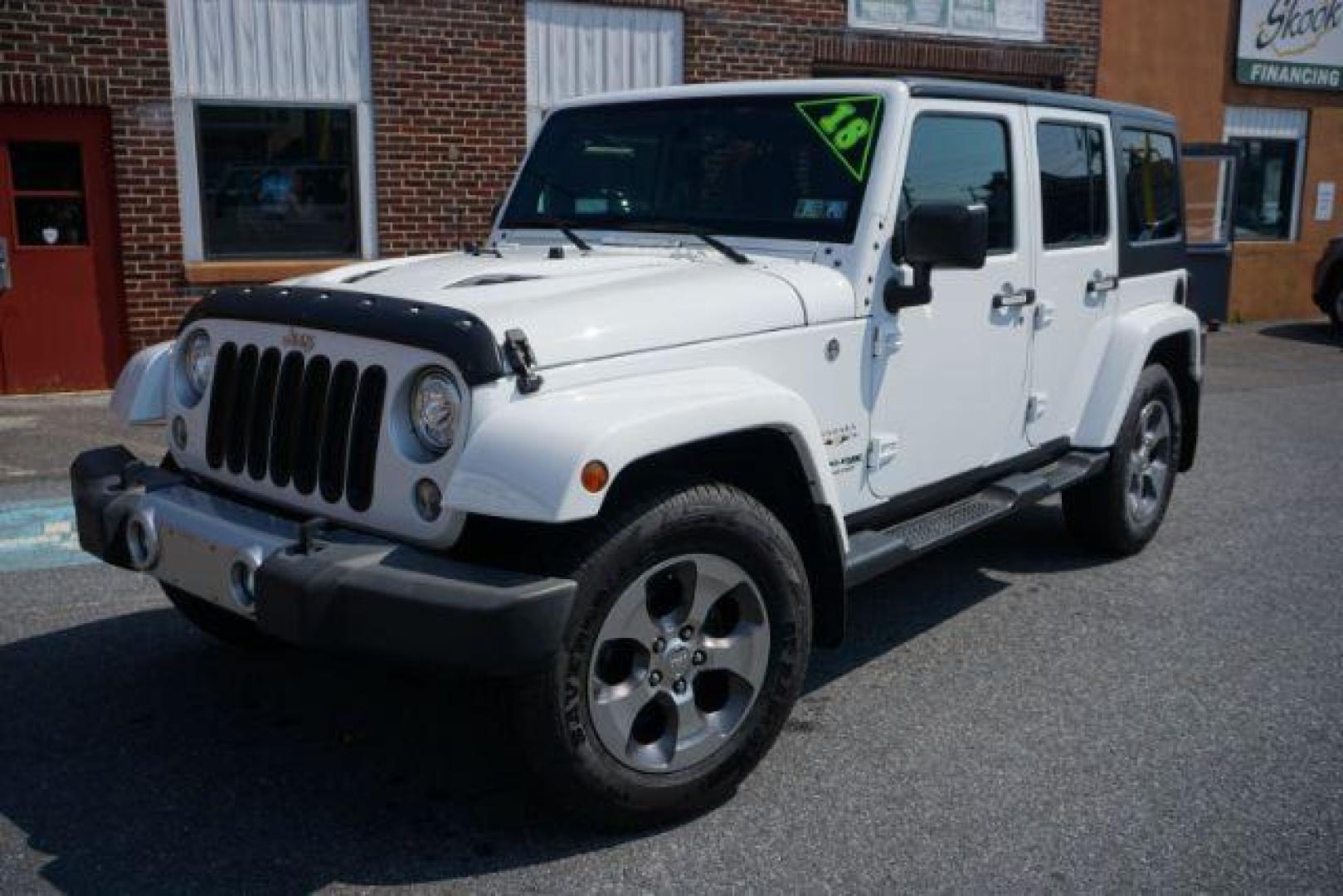 2018 Bright White Clearcoat /Black Jeep Wrangler JK Unlimited Sahara 4x4 (1C4BJWEG0JL) with an Pentastar 3.6L V-6 DOHC engine, located at 312 Centre Ave, Schuylkill Haven, PA, 17972, (570) 593-5278, 40.638130, -76.177383 - Photo#5