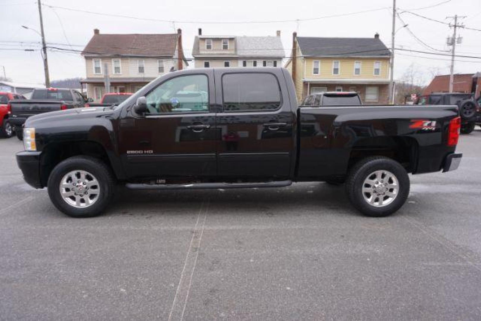 2014 Black /Light Cashmere/Dark Cashmere Chevrolet Silverado 2500HD LTZ (1GC1KYEG9EF) with an Vortec 6L V-8 variable valve control engine, located at 312 Centre Ave, Schuylkill Haven, PA, 17972, (570) 593-5278, 40.638130, -76.177383 - Photo#0
