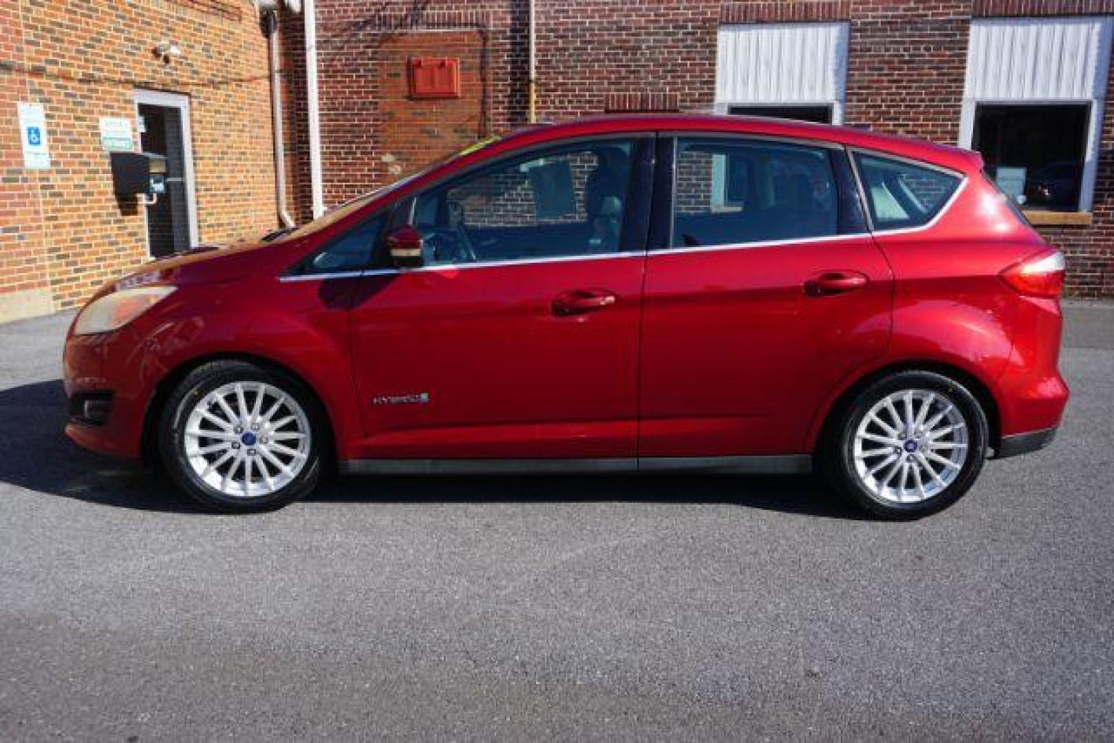 2013 Ruby Red Metallic Tinted Clearcoat /Charcoal Black Ford C-Max Hybrid SEL (1FADP5BU9DL) with an 2L I-4 DOHC engine, located at 312 Centre Ave, Schuylkill Haven, PA, 17972, (570) 593-5278, 40.638130, -76.177383 - Photo#0