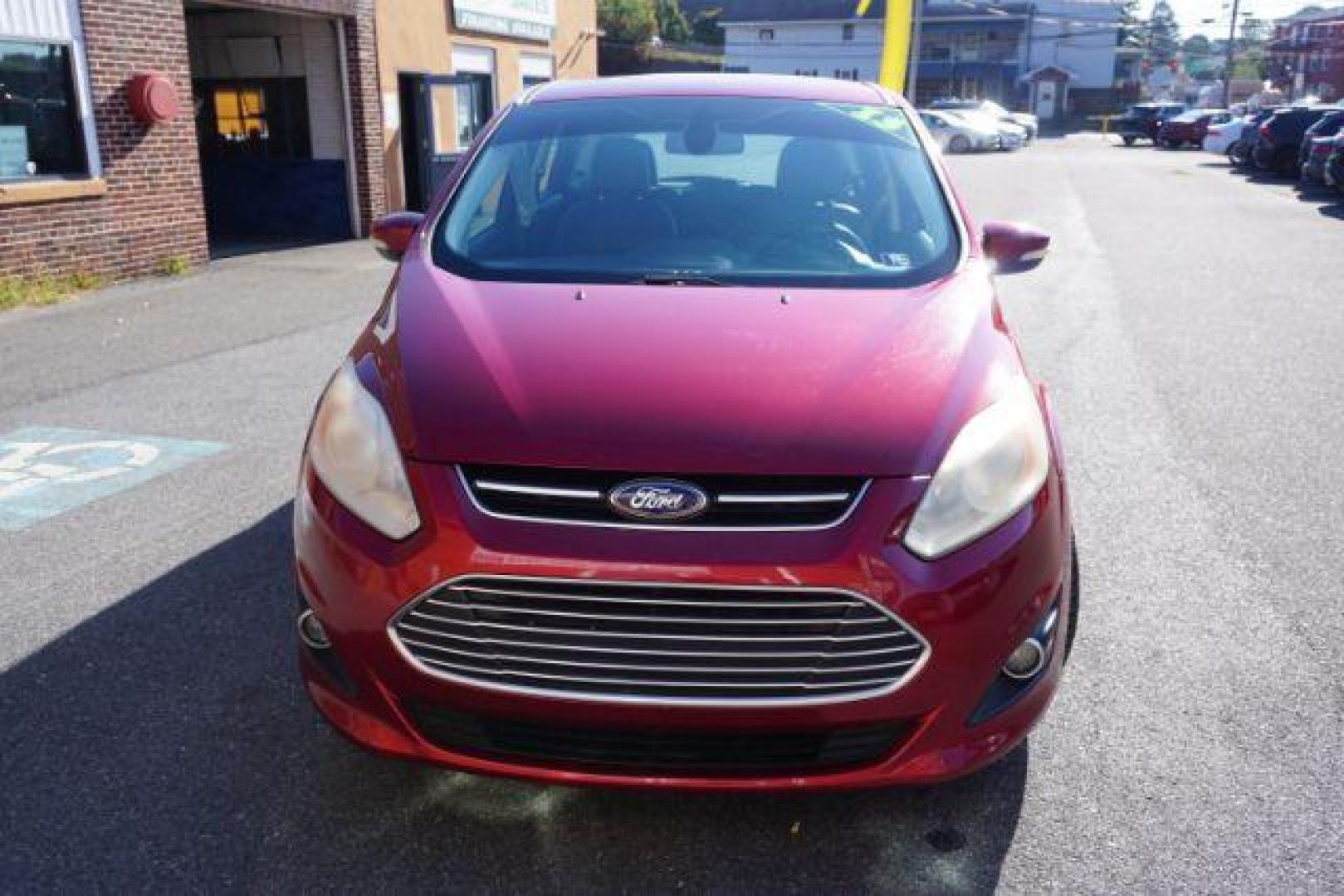 2013 Ruby Red Metallic Tinted Clearcoat /Charcoal Black Ford C-Max Hybrid SEL (1FADP5BU9DL) with an 2L I-4 DOHC engine, located at 312 Centre Ave, Schuylkill Haven, PA, 17972, (570) 593-5278, 40.638130, -76.177383 - Photo#1