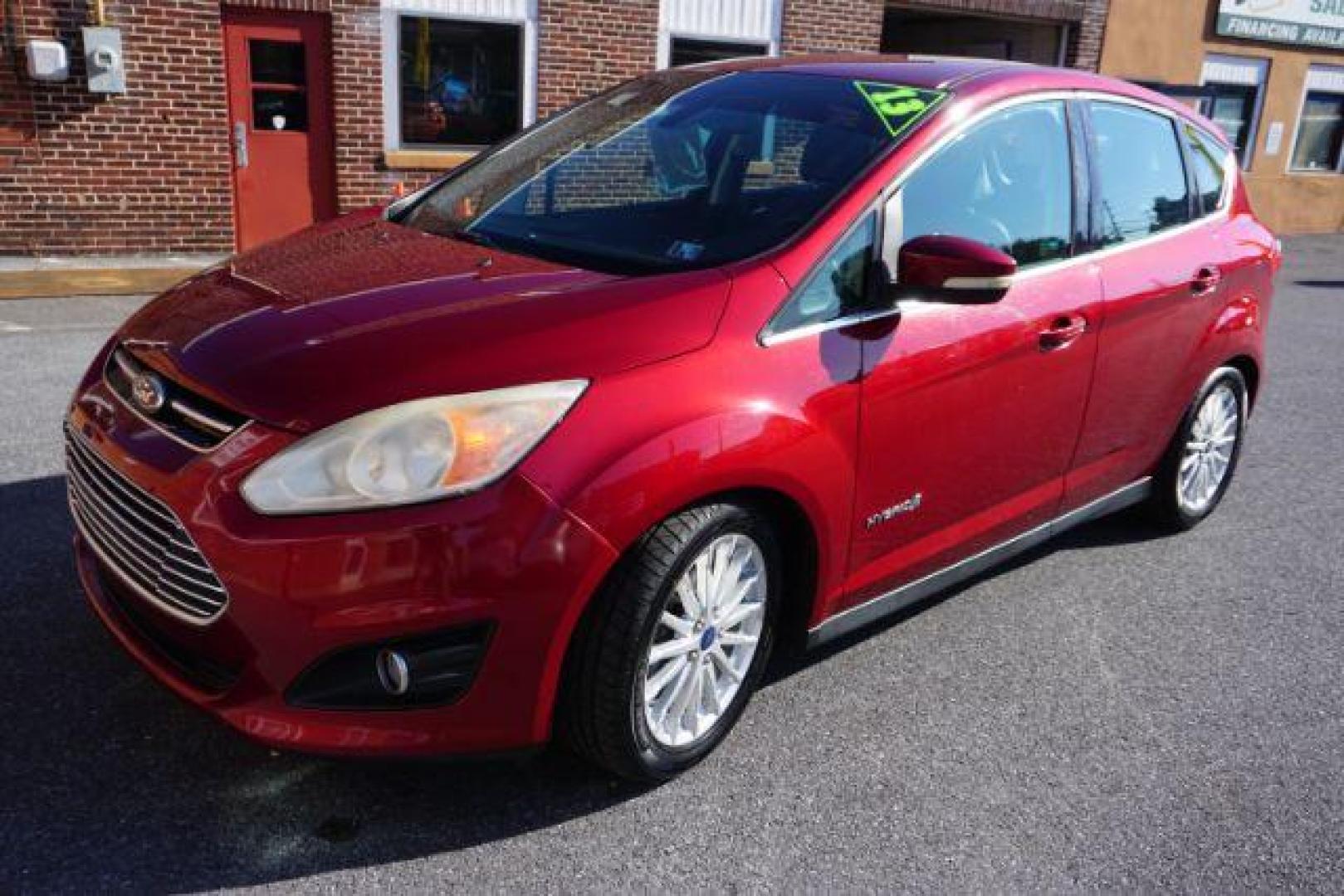 2013 Ruby Red Metallic Tinted Clearcoat /Charcoal Black Ford C-Max Hybrid SEL (1FADP5BU9DL) with an 2L I-4 DOHC engine, located at 312 Centre Ave, Schuylkill Haven, PA, 17972, (570) 593-5278, 40.638130, -76.177383 - Photo#2