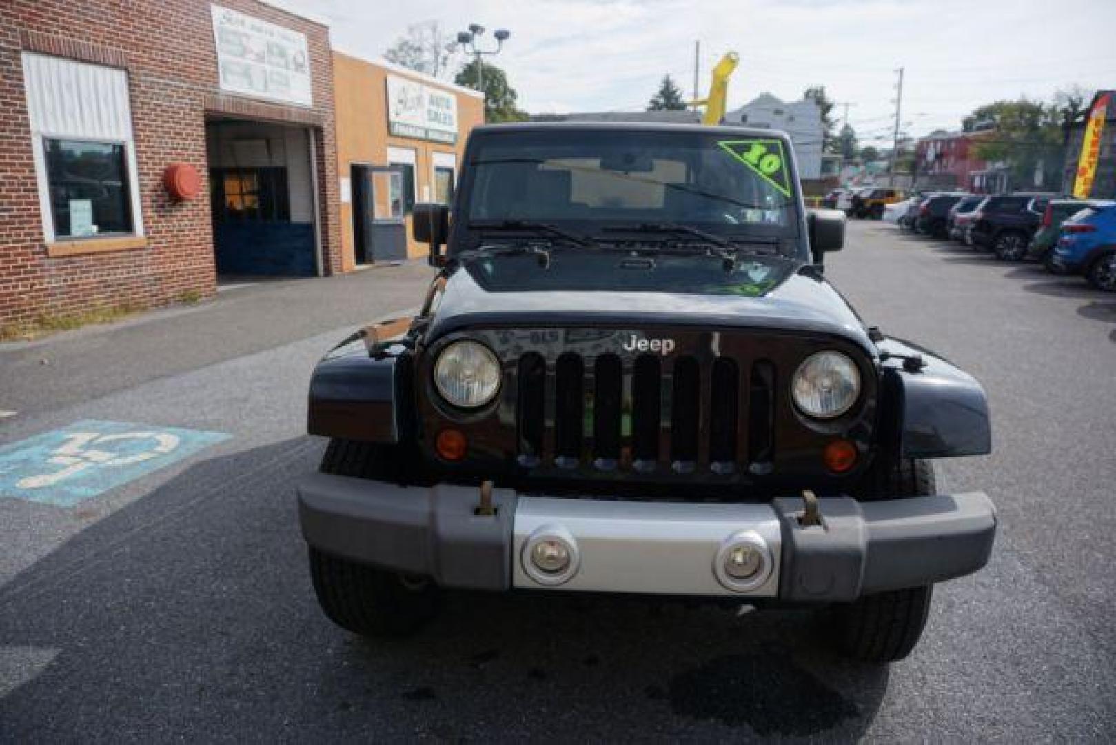 2010 Black Clearcoat/Black Soft Top /Dark Khaki/Medium Khaki Jeep Wrangler Sahara (1J4GA5D10AL) with an 3.8L V-6 regular unleaded engine, located at 312 Centre Ave, Schuylkill Haven, PA, 17972, (570) 593-5278, 40.638130, -76.177383 - Photo#1
