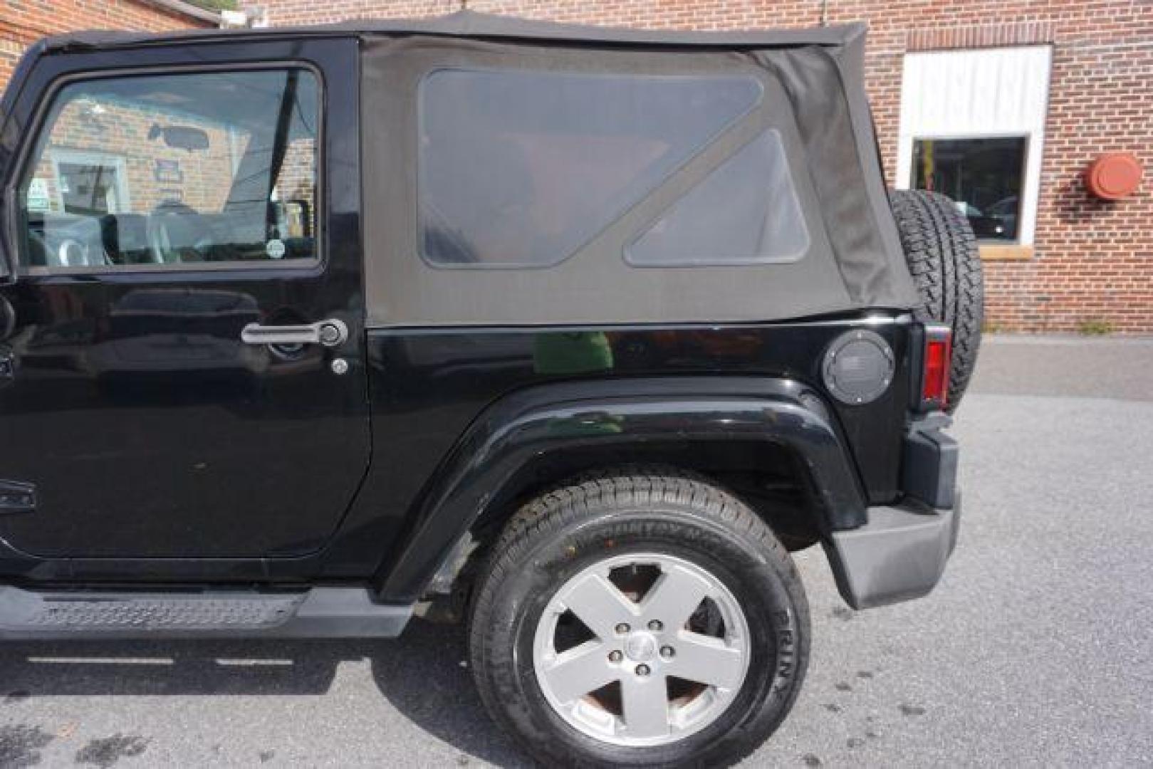 2010 Black Clearcoat/Black Soft Top /Dark Khaki/Medium Khaki Jeep Wrangler Sahara (1J4GA5D10AL) with an 3.8L V-6 regular unleaded engine, located at 312 Centre Ave, Schuylkill Haven, PA, 17972, (570) 593-5278, 40.638130, -76.177383 - Photo#5