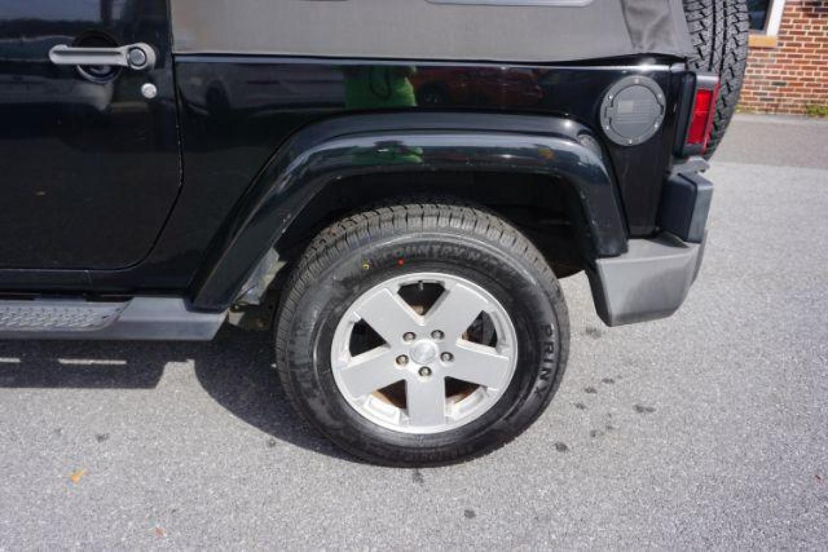 2010 Black Clearcoat/Black Soft Top /Dark Khaki/Medium Khaki Jeep Wrangler Sahara (1J4GA5D10AL) with an 3.8L V-6 regular unleaded engine, located at 312 Centre Ave, Schuylkill Haven, PA, 17972, (570) 593-5278, 40.638130, -76.177383 - Photo#6