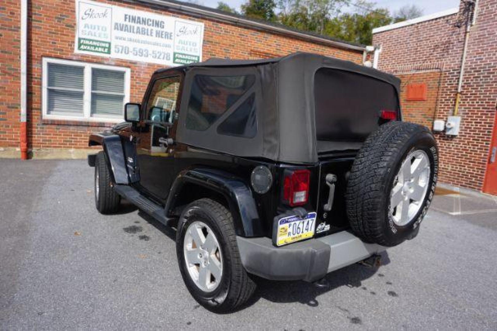 2010 Black Clearcoat/Black Soft Top /Dark Khaki/Medium Khaki Jeep Wrangler Sahara (1J4GA5D10AL) with an 3.8L V-6 regular unleaded engine, located at 312 Centre Ave, Schuylkill Haven, PA, 17972, (570) 593-5278, 40.638130, -76.177383 - Photo#7