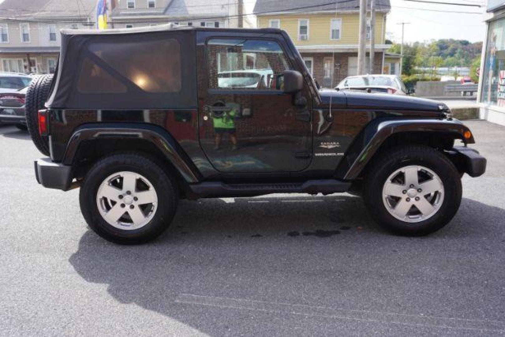 2010 Black Clearcoat/Black Soft Top /Dark Khaki/Medium Khaki Jeep Wrangler Sahara (1J4GA5D10AL) with an 3.8L V-6 regular unleaded engine, located at 312 Centre Ave, Schuylkill Haven, PA, 17972, (570) 593-5278, 40.638130, -76.177383 - Photo#10