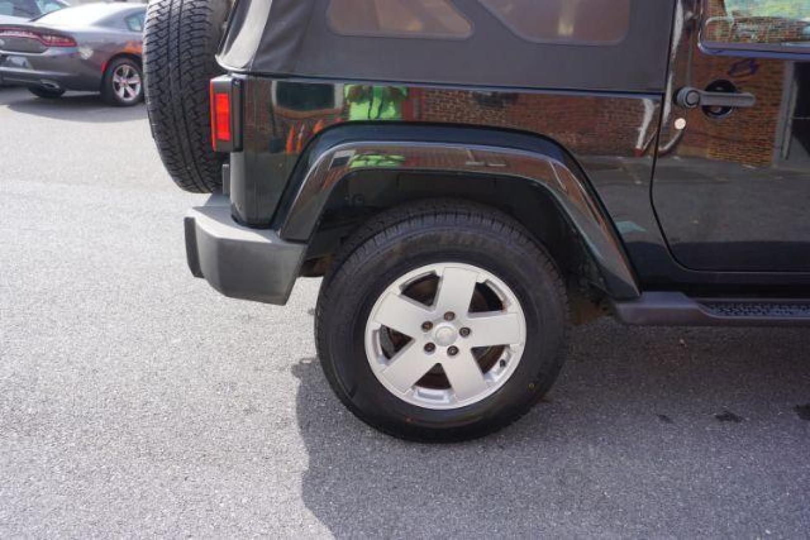 2010 Black Clearcoat/Black Soft Top /Dark Khaki/Medium Khaki Jeep Wrangler Sahara (1J4GA5D10AL) with an 3.8L V-6 regular unleaded engine, located at 312 Centre Ave, Schuylkill Haven, PA, 17972, (570) 593-5278, 40.638130, -76.177383 - Photo#12