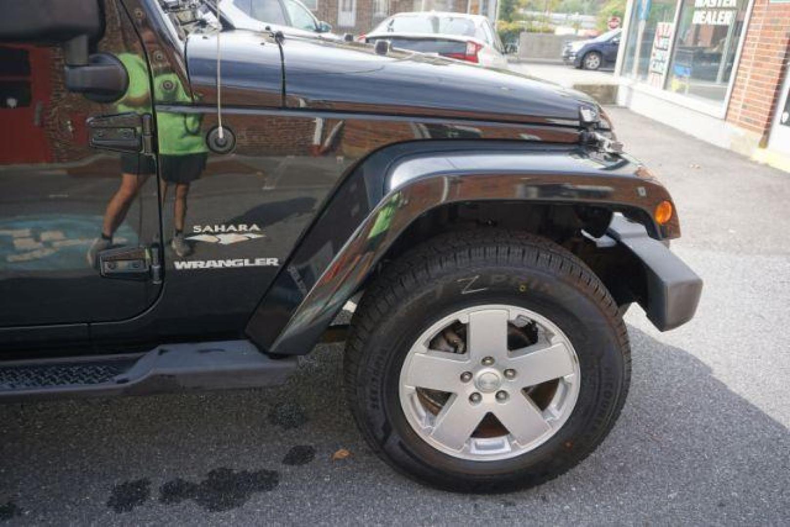 2010 Black Clearcoat/Black Soft Top /Dark Khaki/Medium Khaki Jeep Wrangler Sahara (1J4GA5D10AL) with an 3.8L V-6 regular unleaded engine, located at 312 Centre Ave, Schuylkill Haven, PA, 17972, (570) 593-5278, 40.638130, -76.177383 - Photo#14