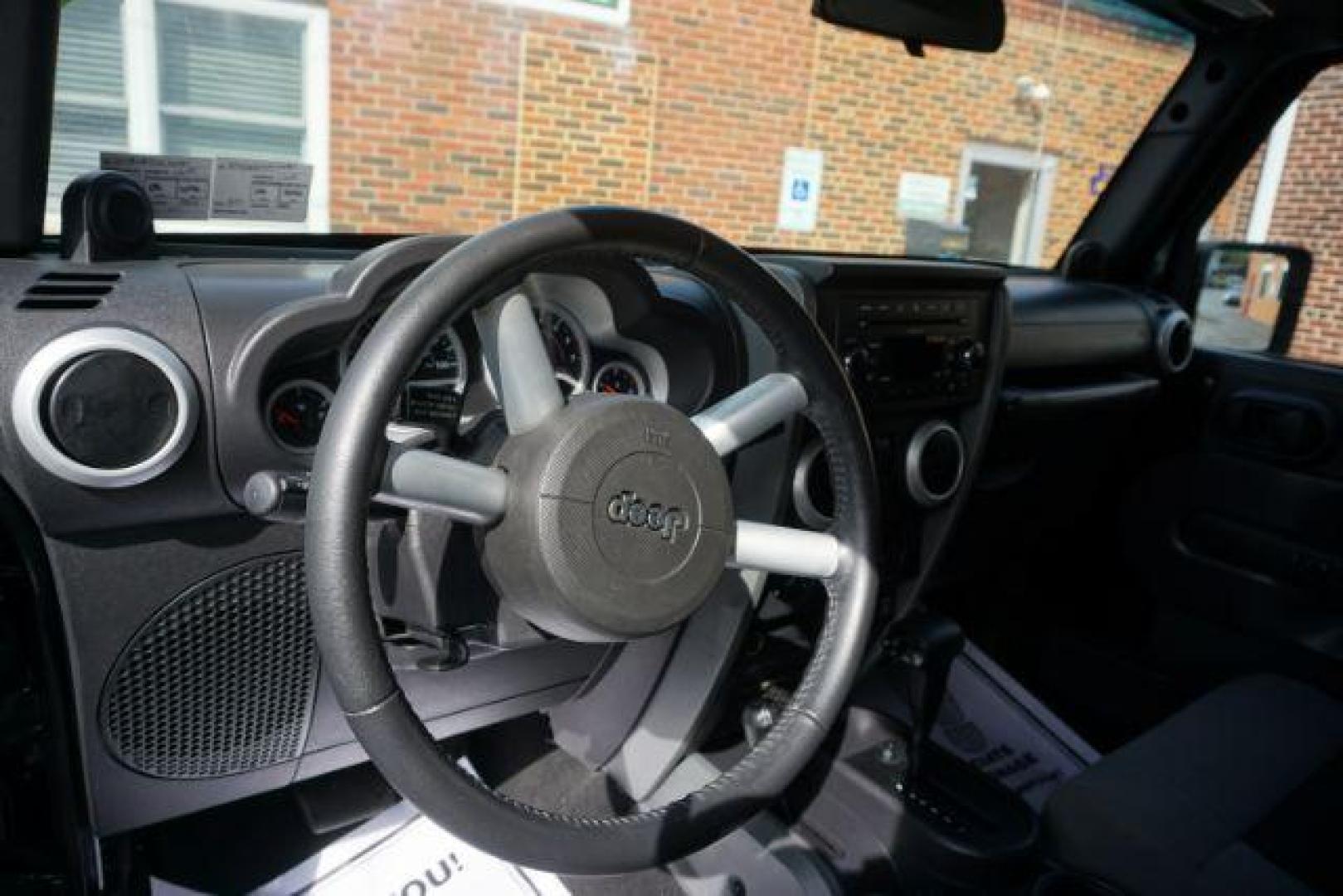 2010 Black Clearcoat/Black Soft Top /Dark Khaki/Medium Khaki Jeep Wrangler Sahara (1J4GA5D10AL) with an 3.8L V-6 regular unleaded engine, located at 312 Centre Ave, Schuylkill Haven, PA, 17972, (570) 593-5278, 40.638130, -76.177383 - Photo#16