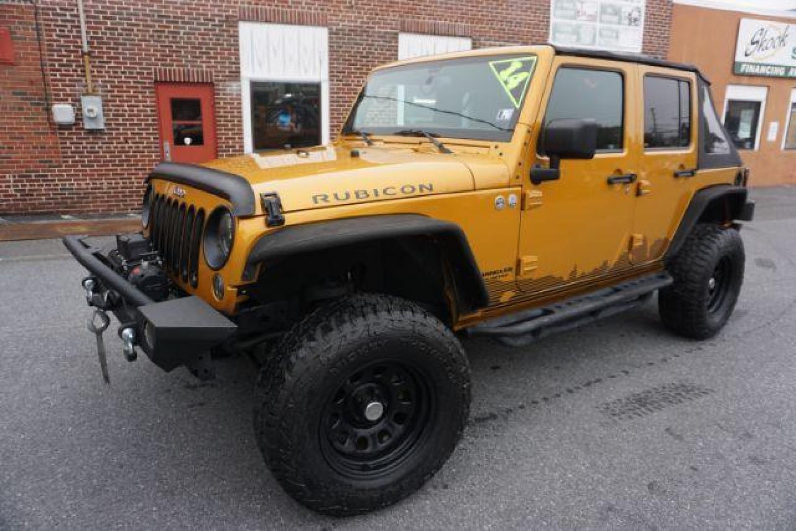 2014 Anvil Clear Coat /Dark Saddle/Black Jeep Wrangler Unlimited Rubicon (1C4BJWFG5EL) with an 3.6L V-6 DOHC engine, located at 312 Centre Ave, Schuylkill Haven, PA, 17972, (570) 593-5278, 40.638130, -76.177383 - Photo#2