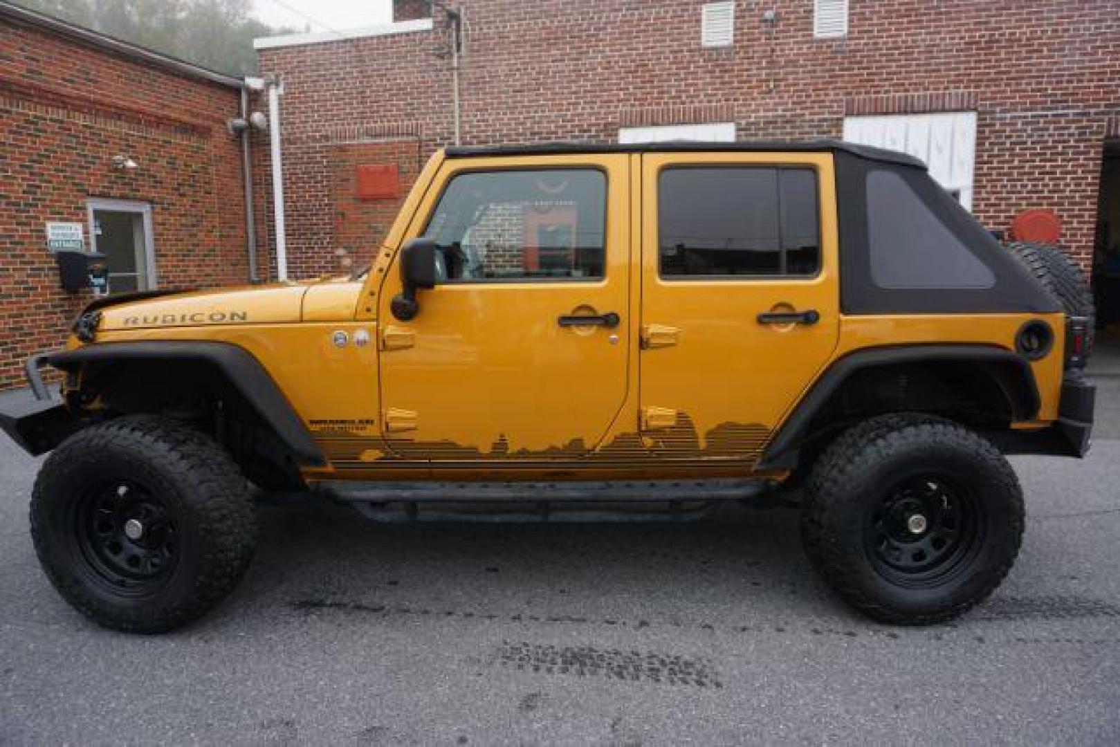2014 Anvil Clear Coat /Dark Saddle/Black Jeep Wrangler Unlimited Rubicon (1C4BJWFG5EL) with an 3.6L V-6 DOHC engine, located at 312 Centre Ave, Schuylkill Haven, PA, 17972, (570) 593-5278, 40.638130, -76.177383 - Photo#3