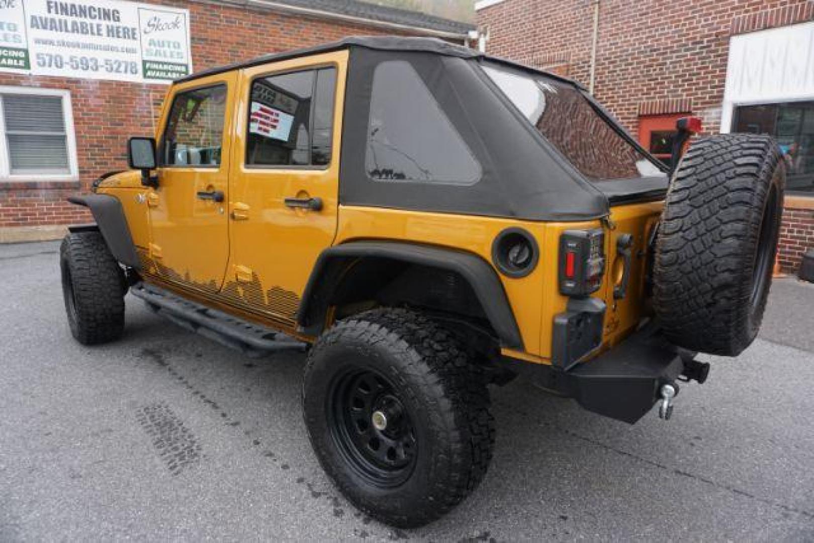 2014 Anvil Clear Coat /Dark Saddle/Black Jeep Wrangler Unlimited Rubicon (1C4BJWFG5EL) with an 3.6L V-6 DOHC engine, located at 312 Centre Ave, Schuylkill Haven, PA, 17972, (570) 593-5278, 40.638130, -76.177383 - Photo#9