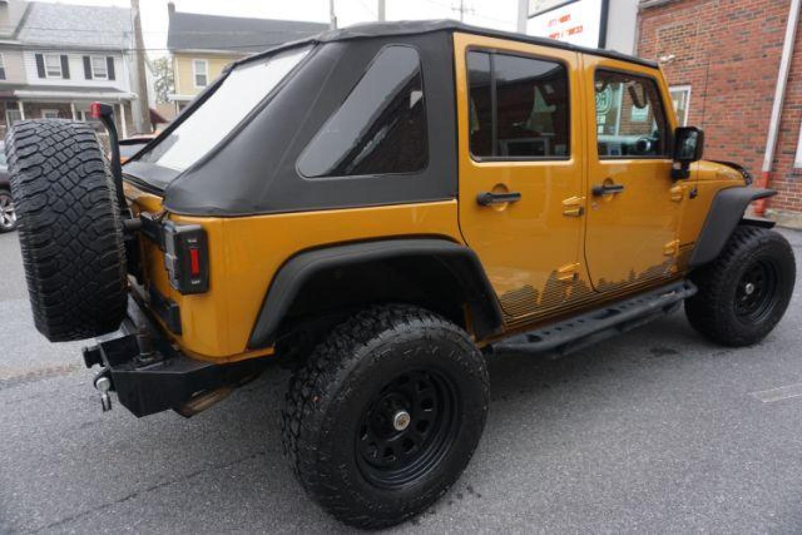 2014 Anvil Clear Coat /Dark Saddle/Black Jeep Wrangler Unlimited Rubicon (1C4BJWFG5EL) with an 3.6L V-6 DOHC engine, located at 312 Centre Ave, Schuylkill Haven, PA, 17972, (570) 593-5278, 40.638130, -76.177383 - Photo#11