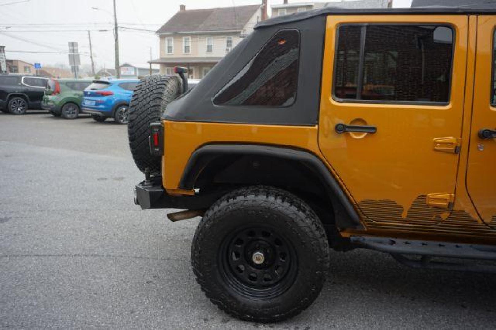 2014 Anvil Clear Coat /Dark Saddle/Black Jeep Wrangler Unlimited Rubicon (1C4BJWFG5EL) with an 3.6L V-6 DOHC engine, located at 312 Centre Ave, Schuylkill Haven, PA, 17972, (570) 593-5278, 40.638130, -76.177383 - Photo#13
