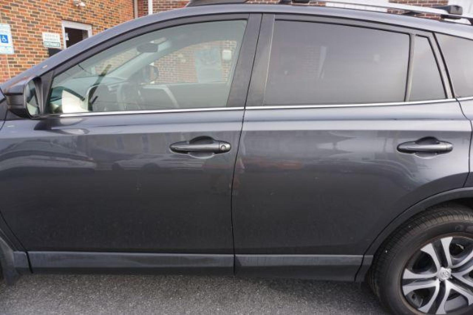 2017 Magnetic Gray Metallic /Black Toyota RAV4 LE (JTMBFREV2HD) with an 2.5L I-4 DOHC engine, located at 312 Centre Ave, Schuylkill Haven, PA, 17972, (570) 593-5278, 40.638130, -76.177383 - Photo#3
