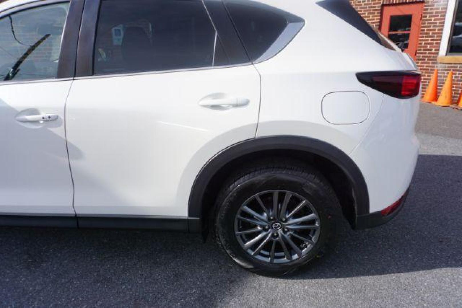 2020 Snowflake White Pearl Mica /Black Mazda CX-5 Touring (JM3KFBCM6L0) with an SKYACTIV-G 2.5L I-4 gasoline direct injection engine, located at 312 Centre Ave, Schuylkill Haven, PA, 17972, (570) 593-5278, 40.638130, -76.177383 - Photo#5