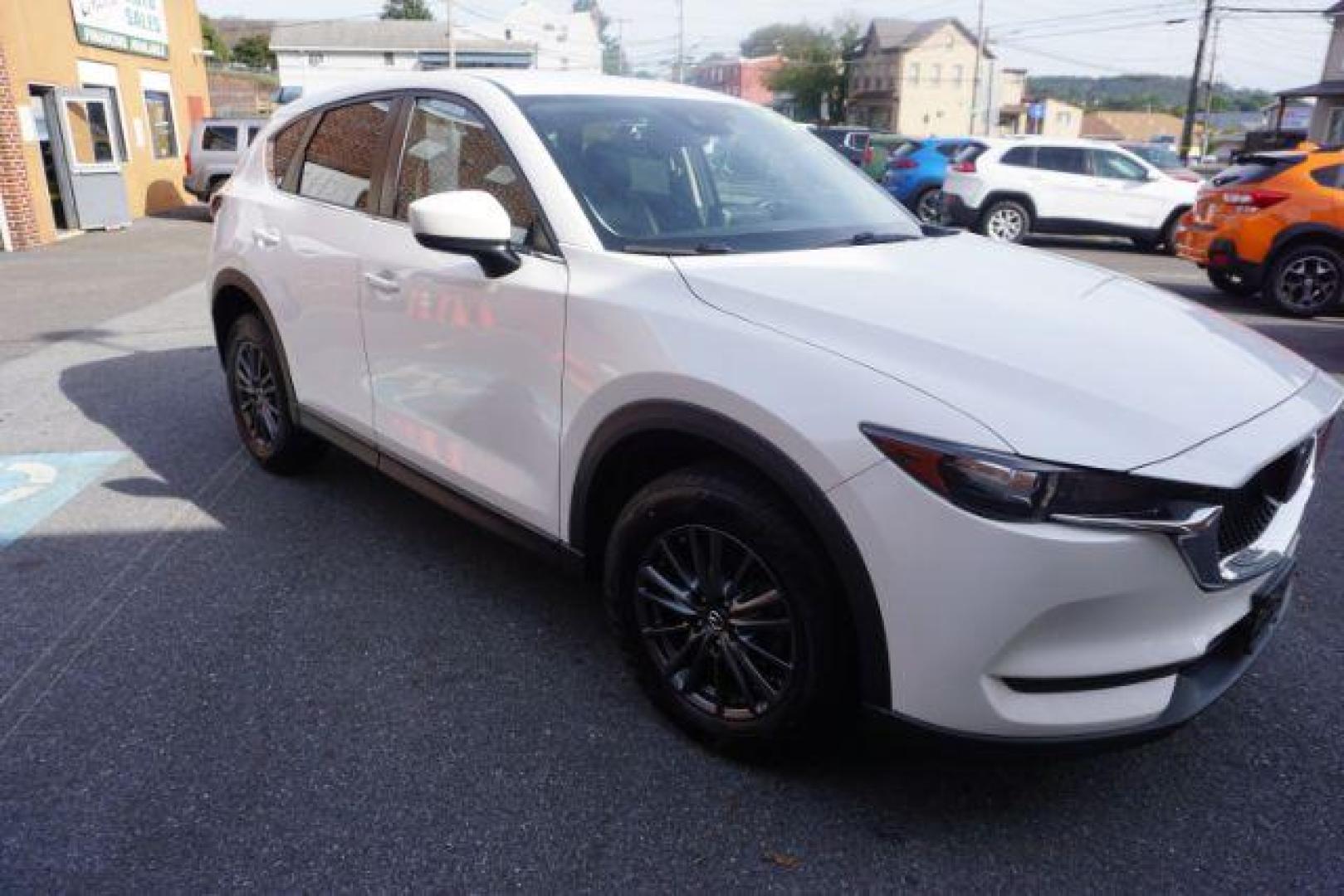 2020 Snowflake White Pearl Mica /Black Mazda CX-5 Touring (JM3KFBCM6L0) with an SKYACTIV-G 2.5L I-4 gasoline direct injection engine, located at 312 Centre Ave, Schuylkill Haven, PA, 17972, (570) 593-5278, 40.638130, -76.177383 - Photo#16