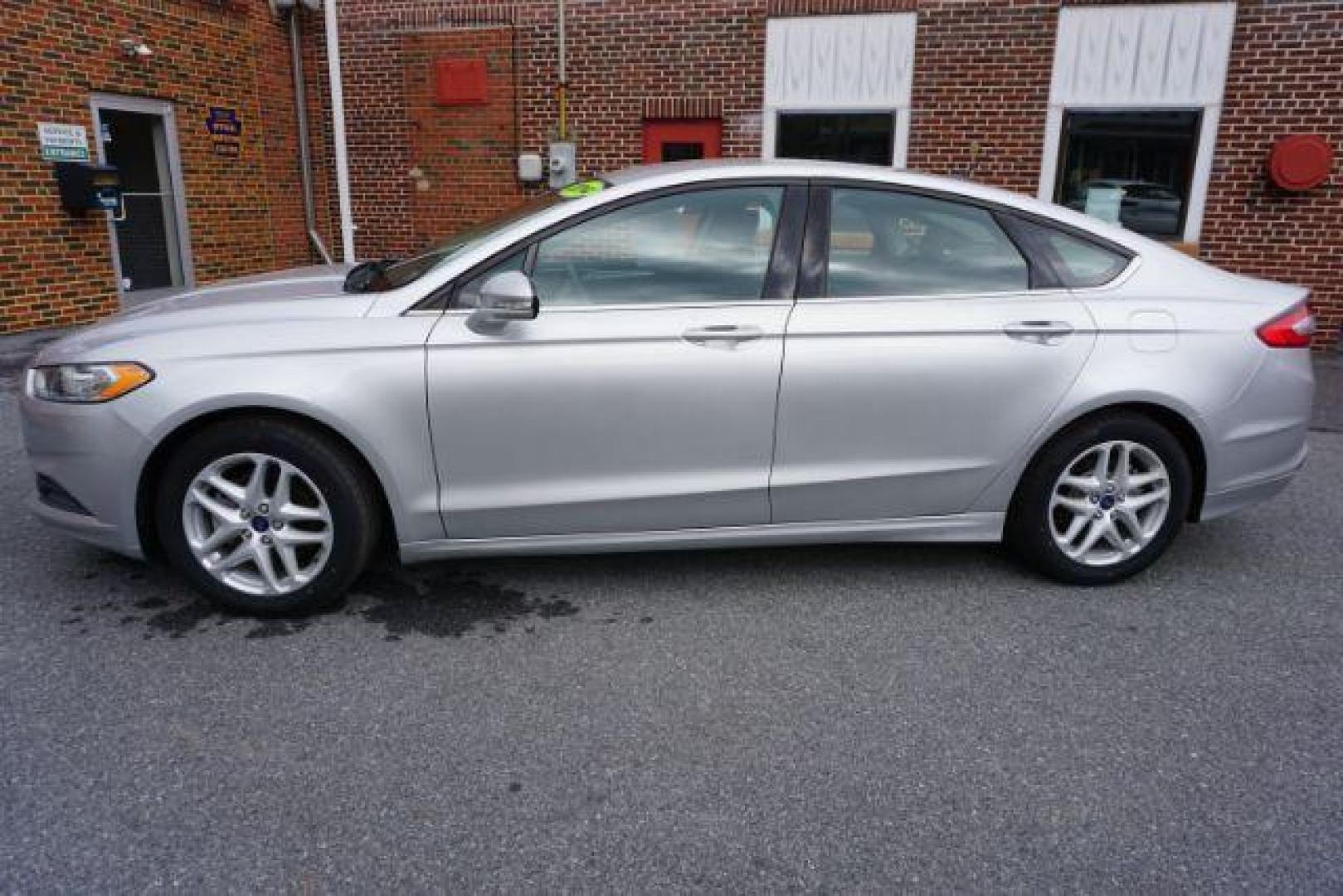 2014 Sterling Gray /Dune Ford Fusion SE (3FA6P0HD0ER) with an 1.5L L4 DOHC 16V engine, located at 312 Centre Ave, Schuylkill Haven, PA, 17972, (570) 593-5278, 40.638130, -76.177383 - Photo#0