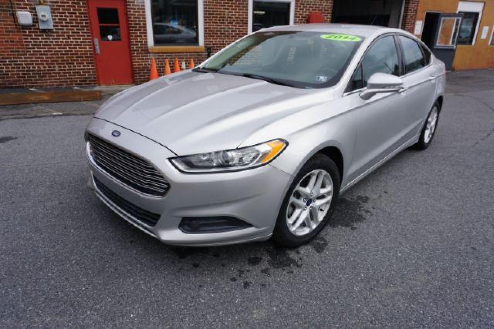 2014 Sterling Gray /Dune Ford Fusion SE (3FA6P0HD0ER) with an 1.5L L4 DOHC 16V engine, located at 312 Centre Ave, Schuylkill Haven, PA, 17972, (570) 593-5278, 40.638130, -76.177383 - Photo#3