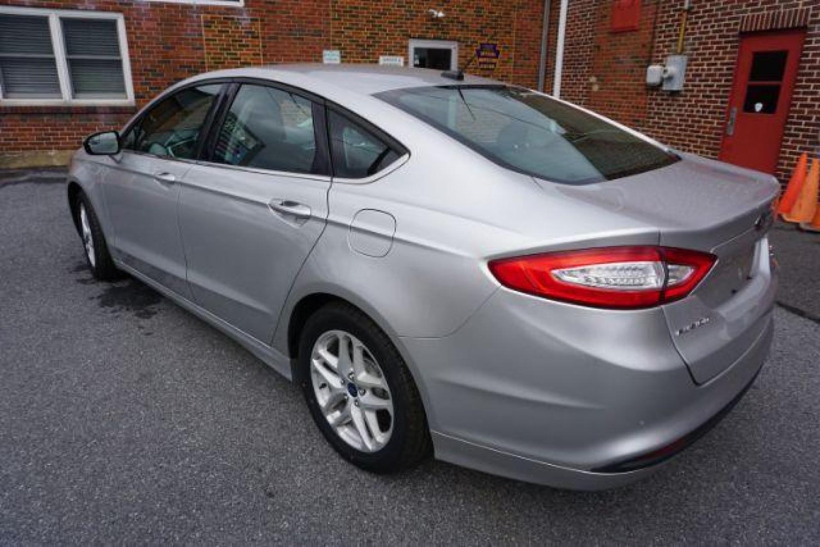 2014 Sterling Gray /Dune Ford Fusion SE (3FA6P0HD0ER) with an 1.5L L4 DOHC 16V engine, located at 312 Centre Ave, Schuylkill Haven, PA, 17972, (570) 593-5278, 40.638130, -76.177383 - Photo#9