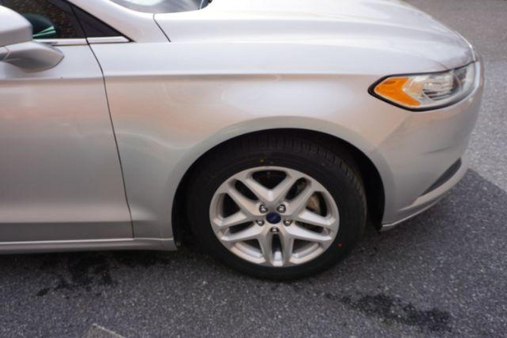 2014 Sterling Gray /Dune Ford Fusion SE (3FA6P0HD0ER) with an 1.5L L4 DOHC 16V engine, located at 312 Centre Ave, Schuylkill Haven, PA, 17972, (570) 593-5278, 40.638130, -76.177383 - Photo#16