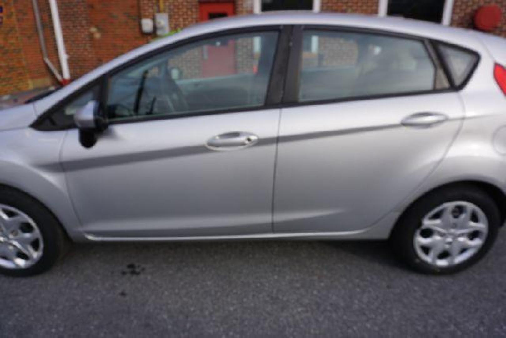 2013 Ingot Silver Metalli Ford Fiesta S Hatchback (3FADP4TJ8DM) with an 1.6L L4 DOHC 16V engine, 6-Speed Automatic transmission, located at 312 Centre Ave, Schuylkill Haven, PA, 17972, (570) 593-5278, 40.638130, -76.177383 - Photo#6