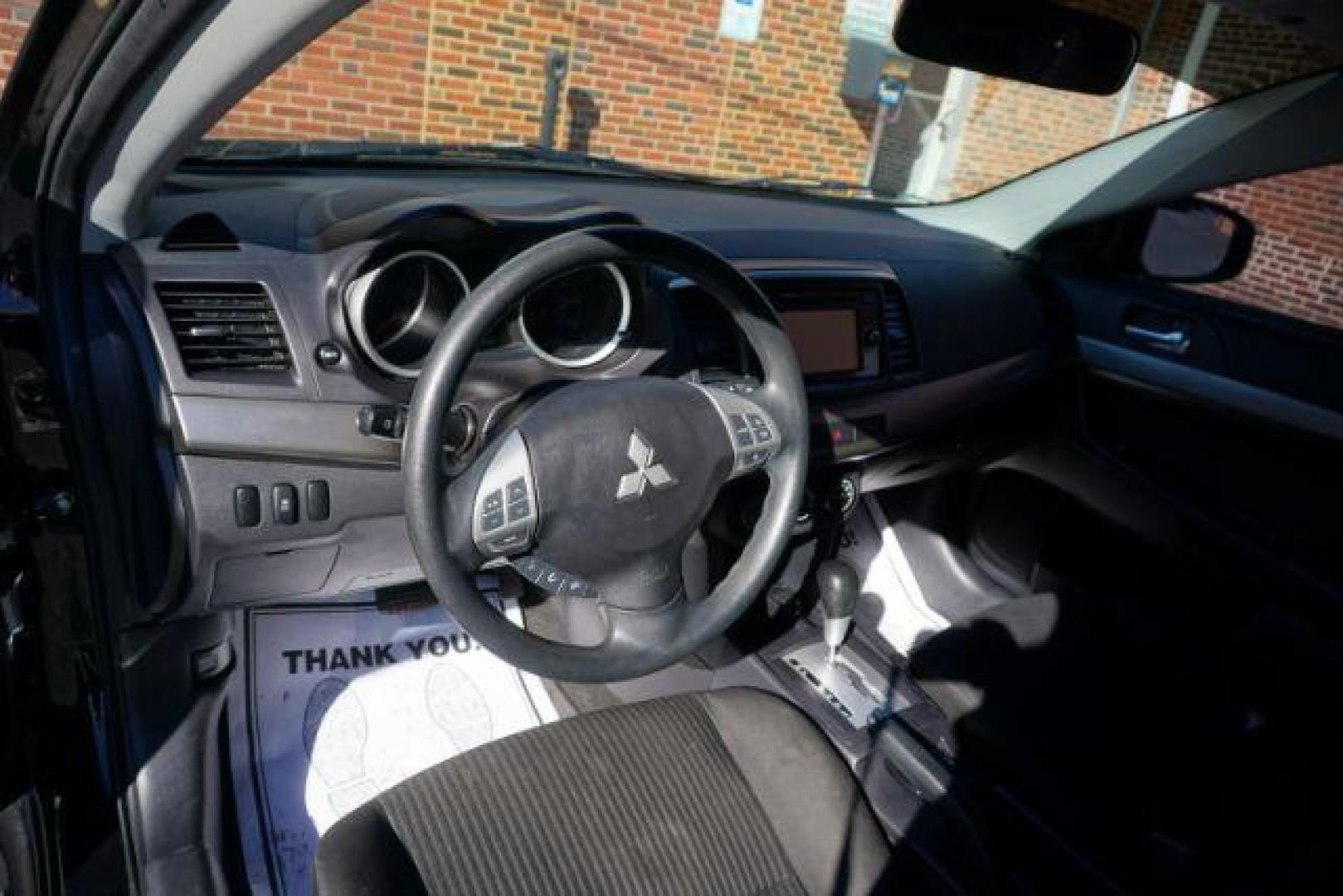 2015 Tarmac Black Pearl /Black Mitsubishi Lancer SE (JA32V2FW6FU) with an 2.4L I-4 DOHC engine, located at 312 Centre Ave, Schuylkill Haven, PA, 17972, (570) 593-5278, 40.638130, -76.177383 - Photo#21