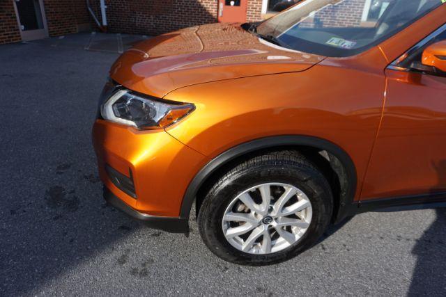 2019 Monarch Orange Metallic /Charcoal Nissan Rogue SV (JN8AT2MV3KW) with an 2.5L I-4 DOHC engine, located at 312 Centre Ave, Schuylkill Haven, PA, 17972, (570) 593-5278, 40.638130, -76.177383 - Photo#4