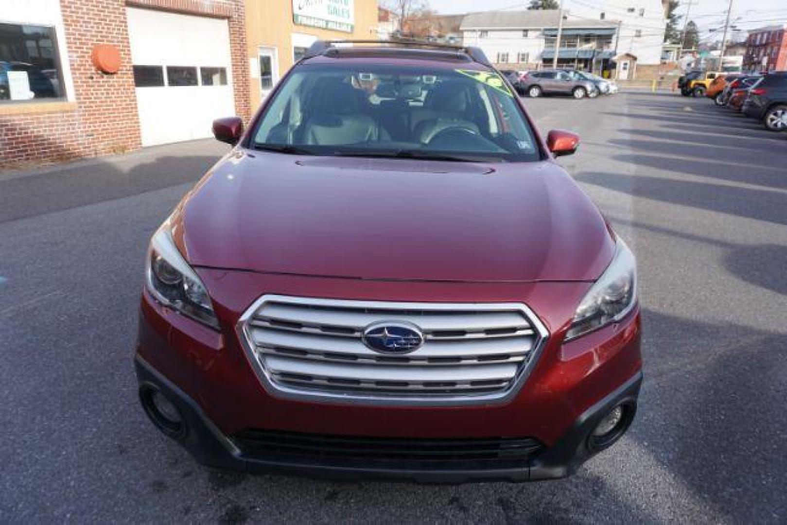 2016 Venetian Red Pearl /Slate Black Subaru Outback 2.5i Limited (4S4BSANC6G3) with an 2.5L H-4 DOHC engine, located at 312 Centre Ave, Schuylkill Haven, PA, 17972, (570) 593-5278, 40.638130, -76.177383 - Photo#1