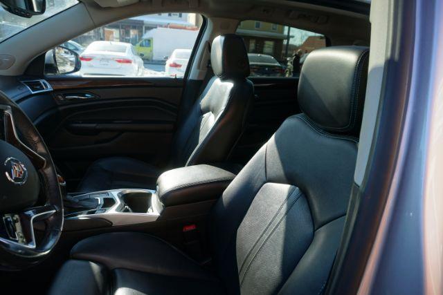 2015 Silver Coast Metallic /Ebony/Ebony Accents Cadillac SRX Luxury Collection (3GYFNEE36FS) with an 3.6L V-6 gasoline direct injection engine, located at 312 Centre Ave, Schuylkill Haven, PA, 17972, (570) 593-5278, 40.638130, -76.177383 - Photo#19